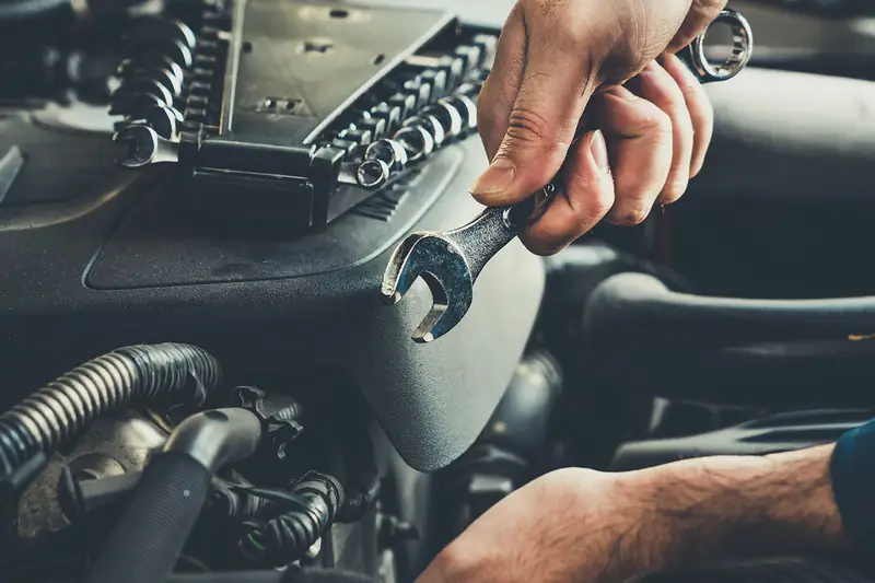 A mechanic's wrench on an engine: the repair that will not wait for next quarter.